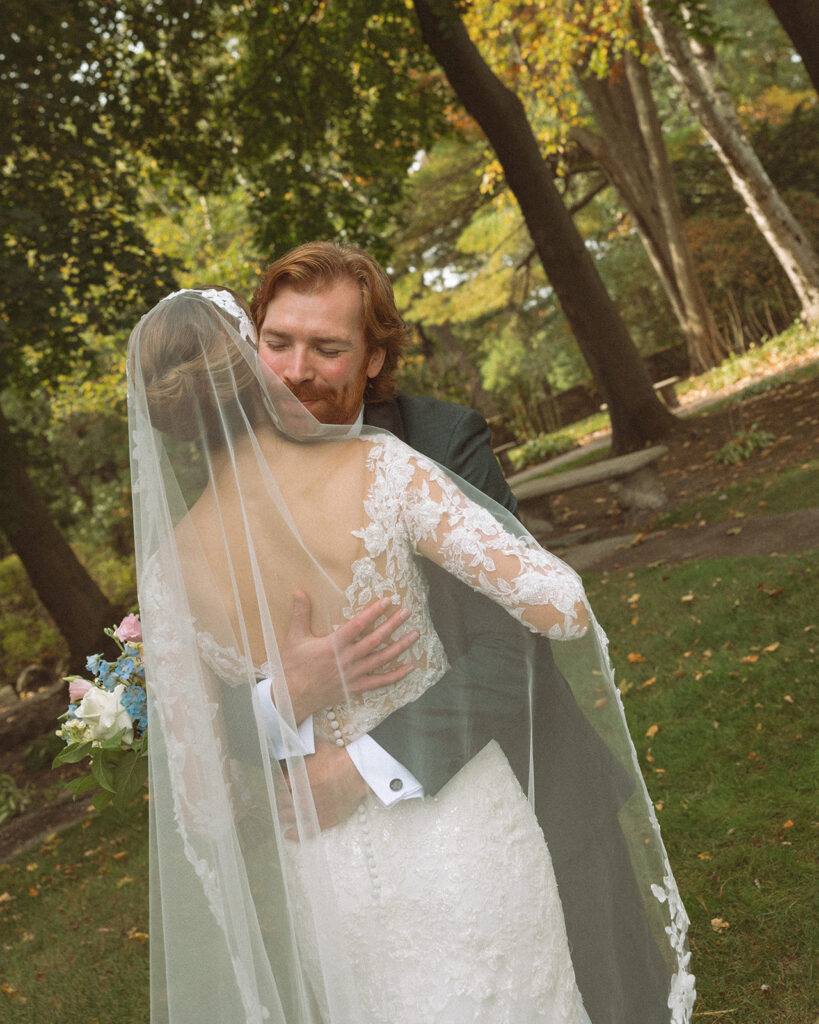 Bride and groom hugging after their first look