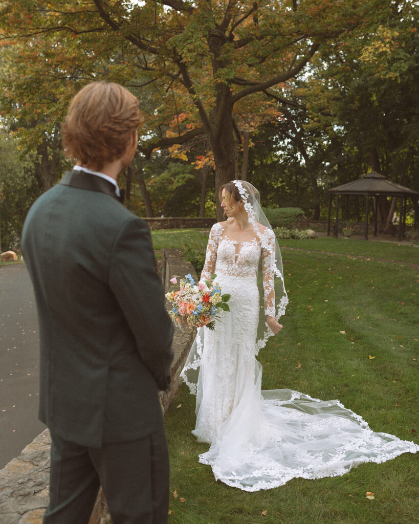 Outdoor bride and grooms portraits from a Pine Knob Mansion wedding in Clarkston, MI