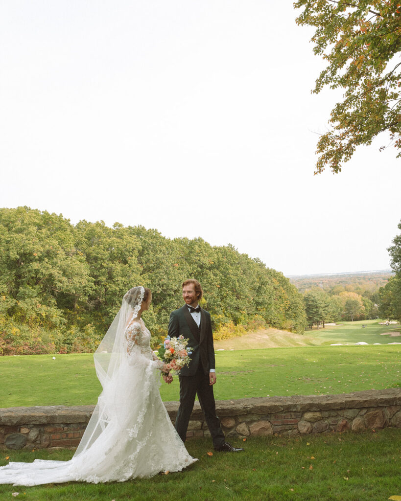 Outdoor bride and grooms portraits from a Pine Knob Mansion wedding in Clarkston, MI