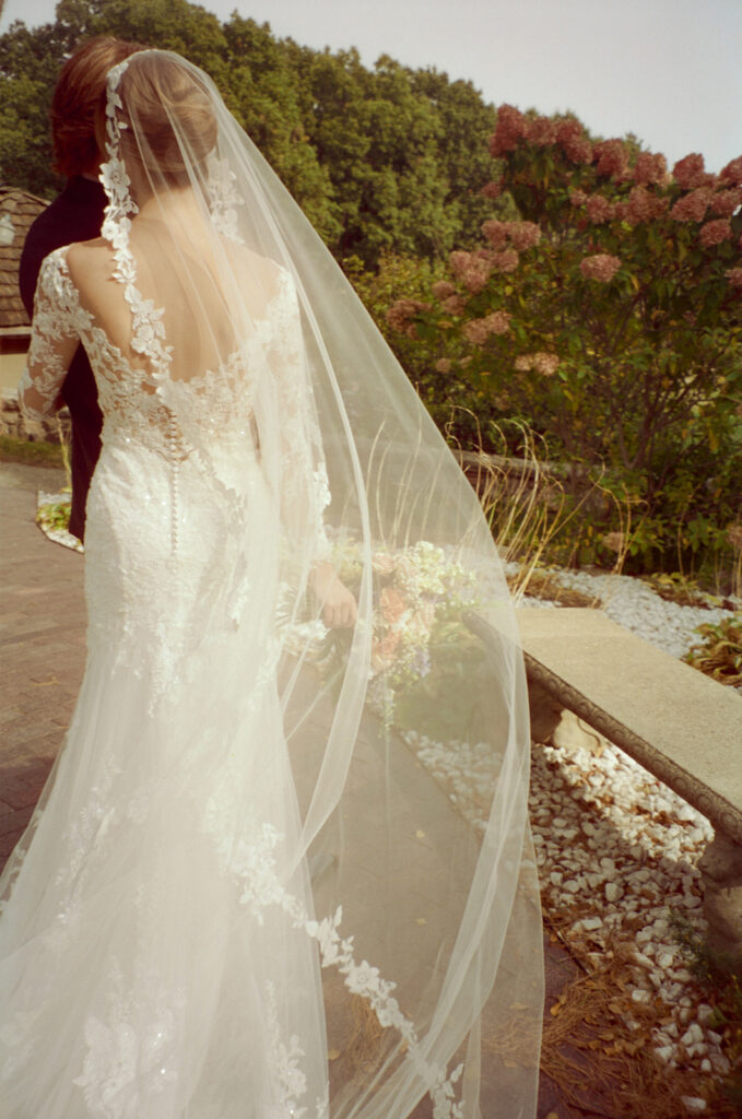 Outdoor bride and grooms portraits on film from a Pine Knob Mansion wedding in Clarkston, MI