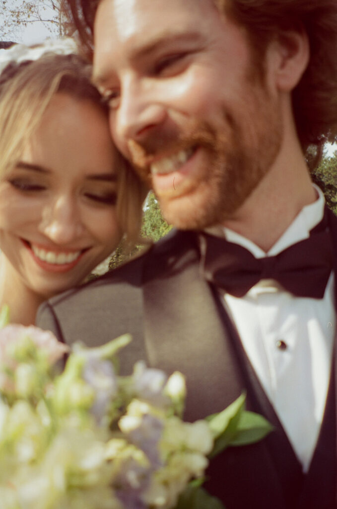 Outdoor bride and grooms portraits on film from a Pine Knob Mansion wedding in Clarkston, MI