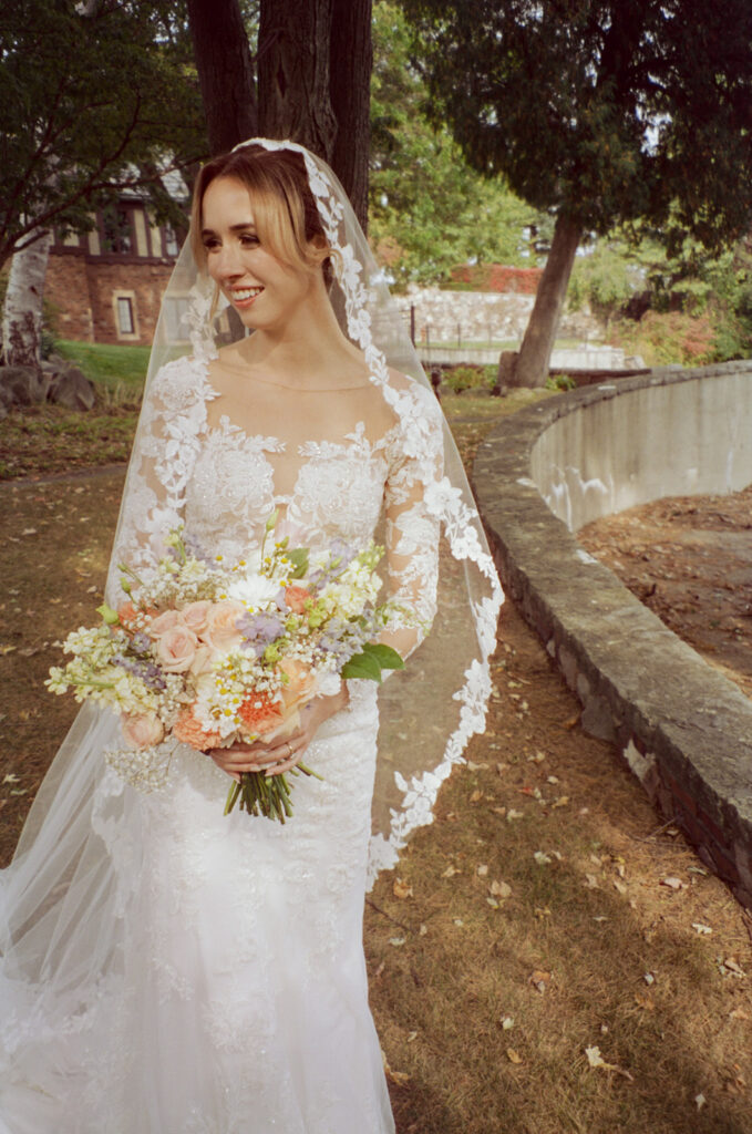 Outdoor bridal portraits on film from a Pine Knob Mansion wedding in Clarkston, MI