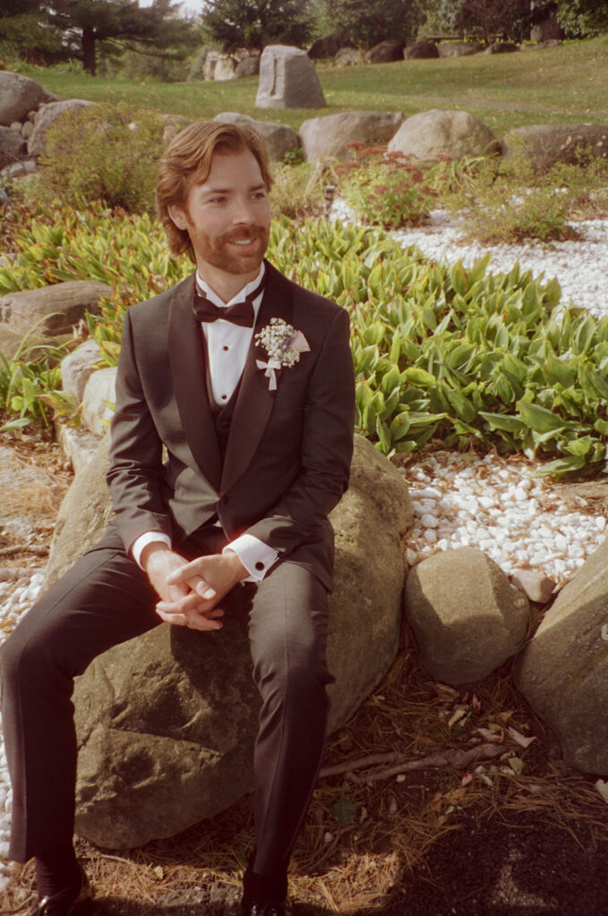 Outdoor grooms portraits on film from a Pine Knob Mansion wedding in Clarkston, MI