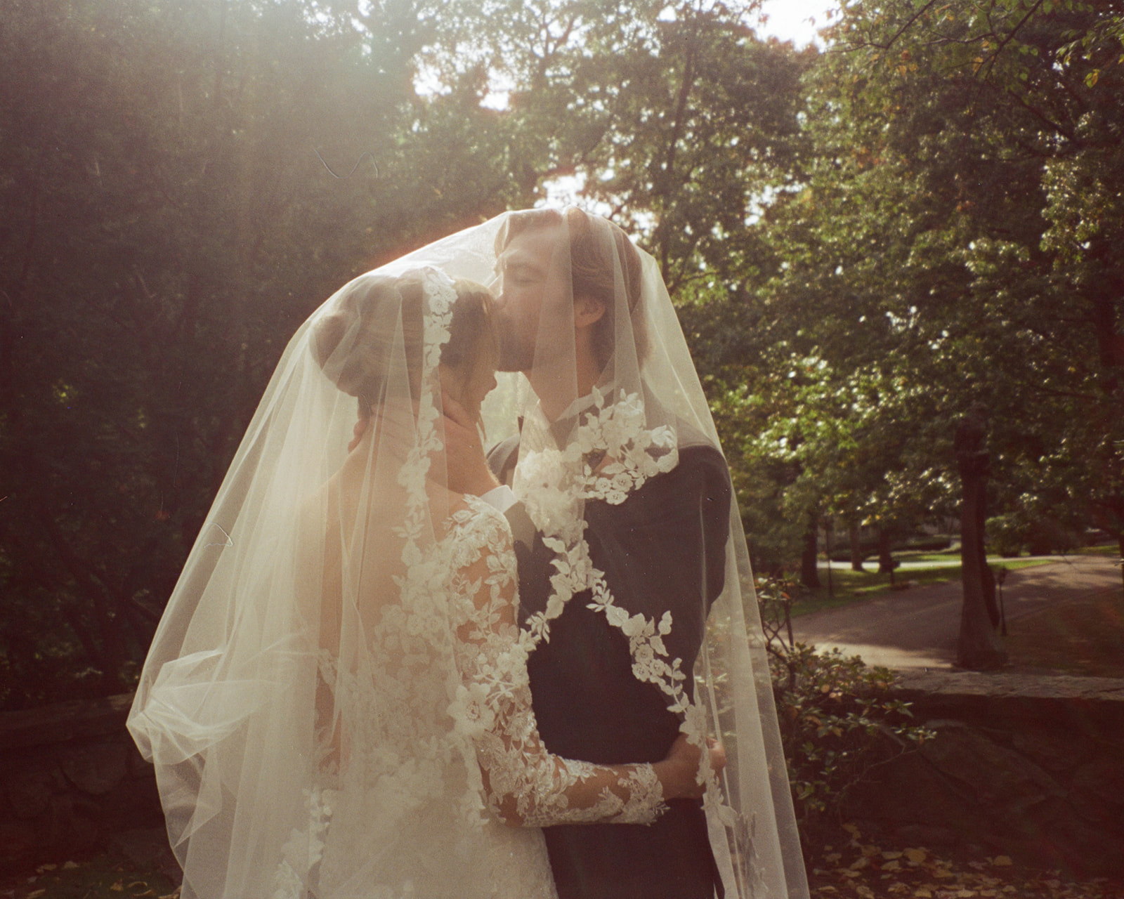 Outdoor bride and grooms portraits on film from a Pine Knob Mansion wedding in Clarkston, MI