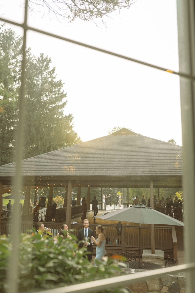 An outdoor Pine Knob Mansion wedding cocktail