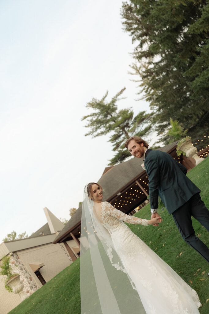 Outdoor bride and groom portraits from a Pine Knob Mansion wedding in Clarkston, Michigan