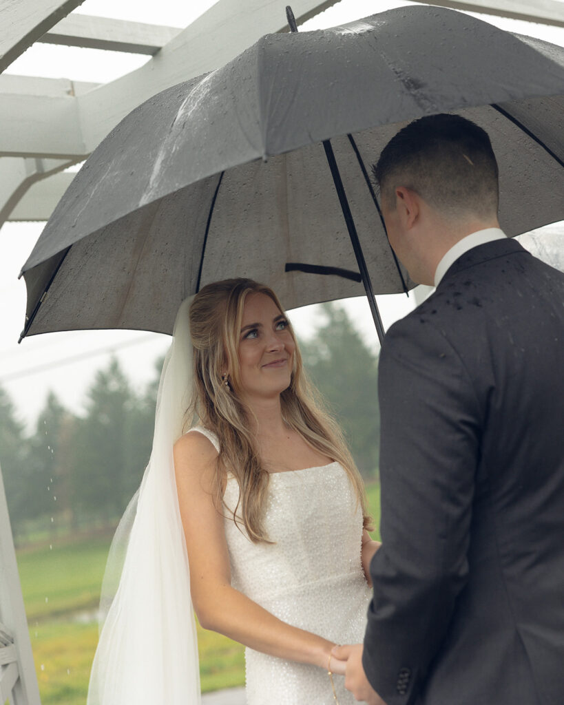 Rainy outdoor Fox Hill Golf Club wedding ceremony in greater Detroit
