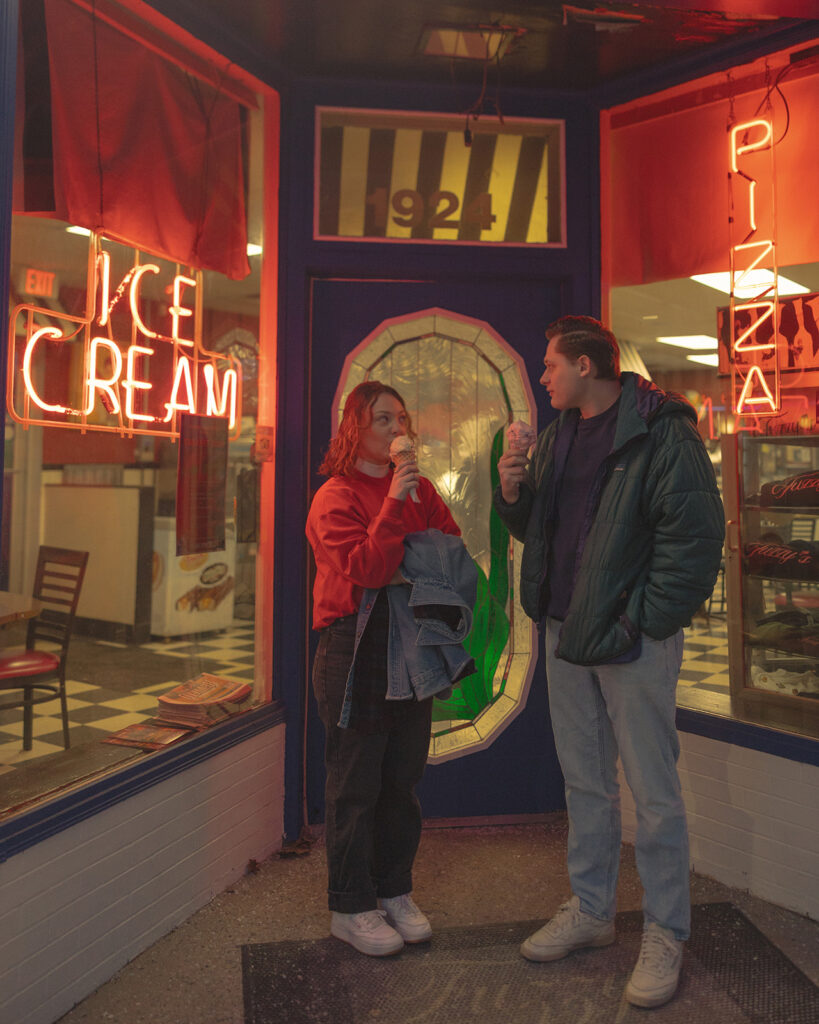 Couples ice cream shop engagement photos at Mooney's Ice Cream in Michigan