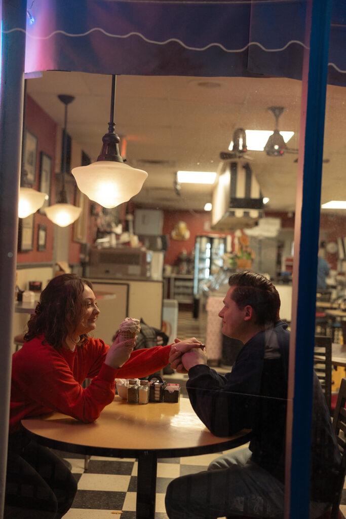 Couple eating ice cream together at a Michigan Ice Cream Shop