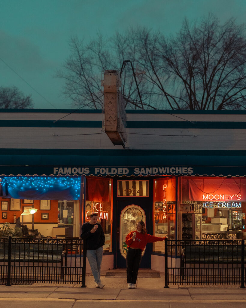 Couples ice cream shop engagement photos at Mooney's Ice Cream in Michigan