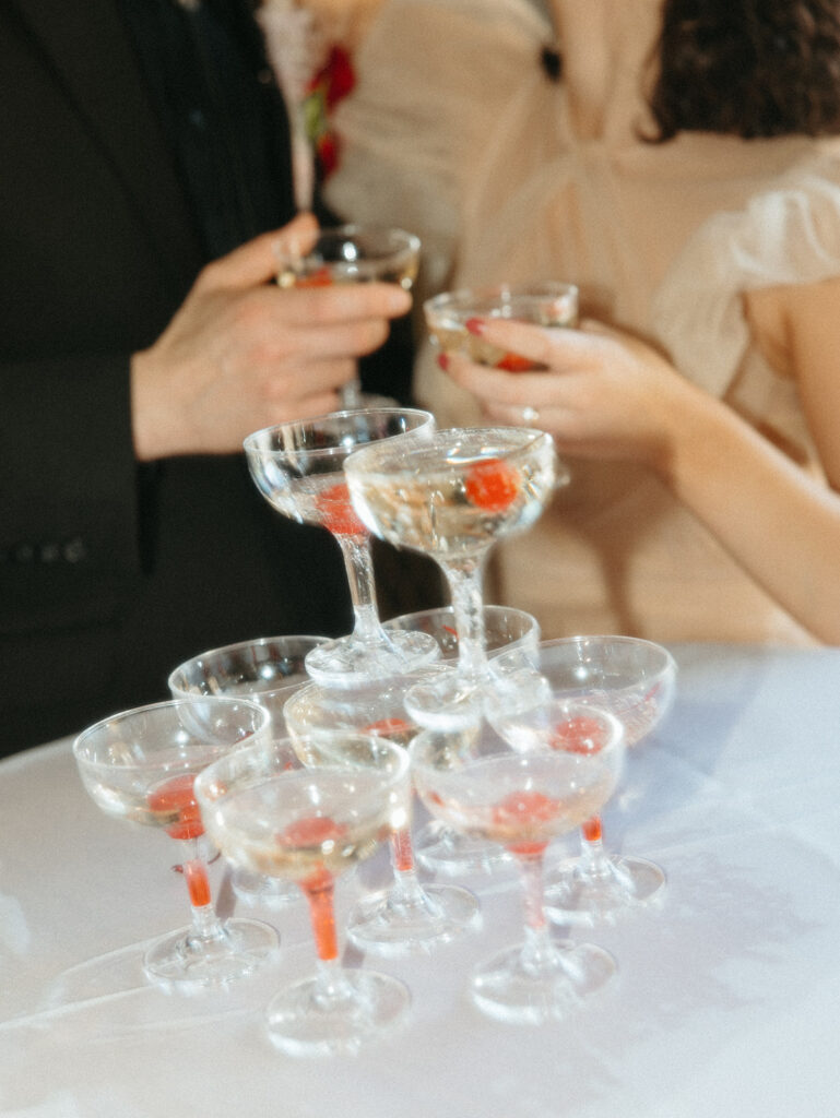 Bride and grooms elopement champagne tower