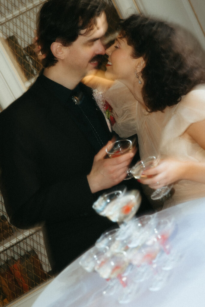 Bride and grooms elopement champagne tower