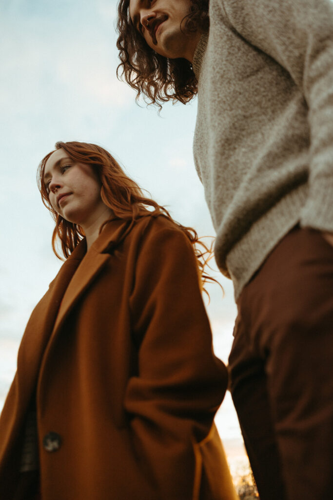 Couples fall engagement photos in a Michigan field
