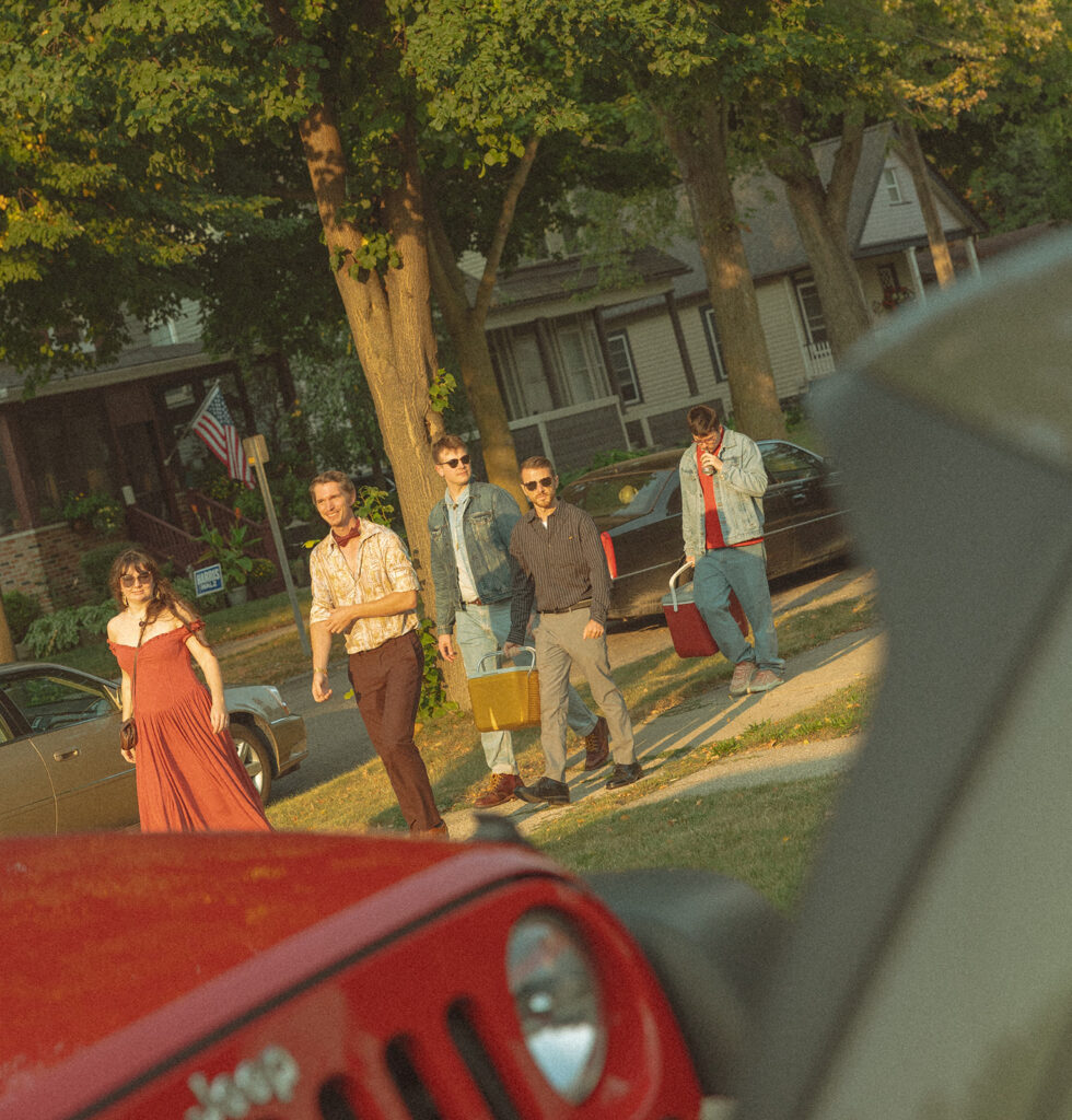 Guests showing up to a backyard wedding in Michigan