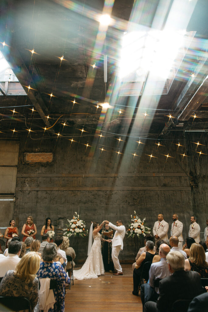 Bride and grooms Jam Handy Detroit wedding ceremony - Unique Wedding Venues in Michigan
