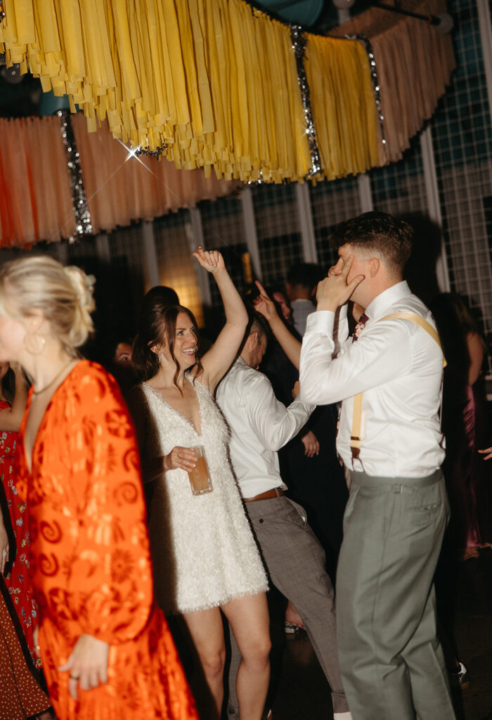 Bride and groom dancing during the reception