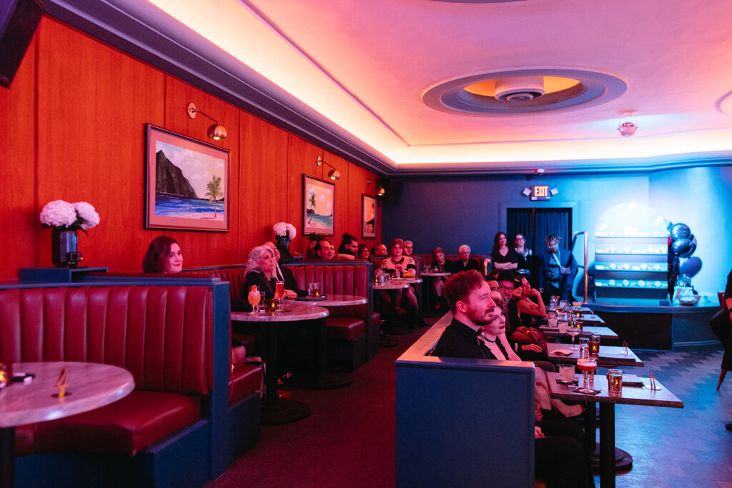 Guests seated at Willis Show Bar in Detroit, Michigan for a wedding