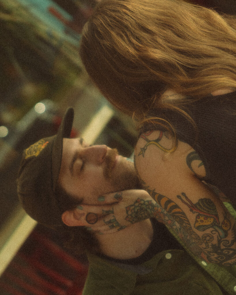 Close up shot of a woman caressing her fiancés face lovingly.