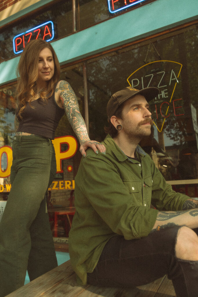 Editorial low-key engagement photos at Old World Pizzeria in Saginaw, Michigan