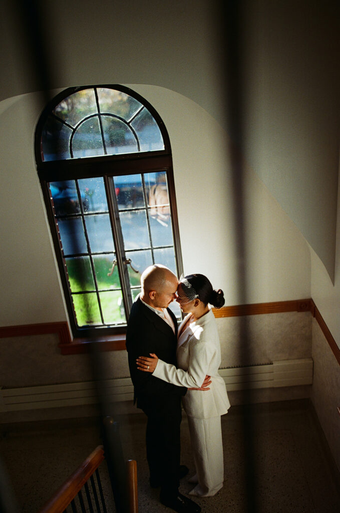 Intimate elopement photos on film taken at Birmingham City Hall.