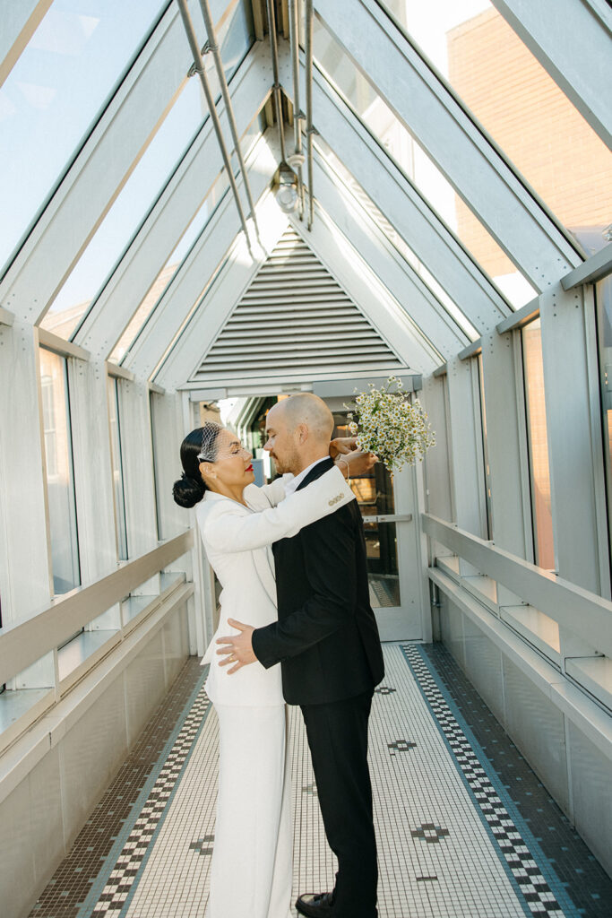 Couple embracing during their romantic Detroit elopement photos. 