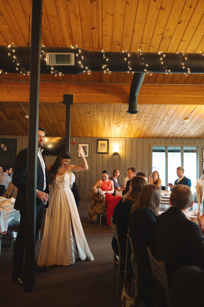 Bride and groom giving a speech during their Michigan wedding reception captured in a documentary style. 