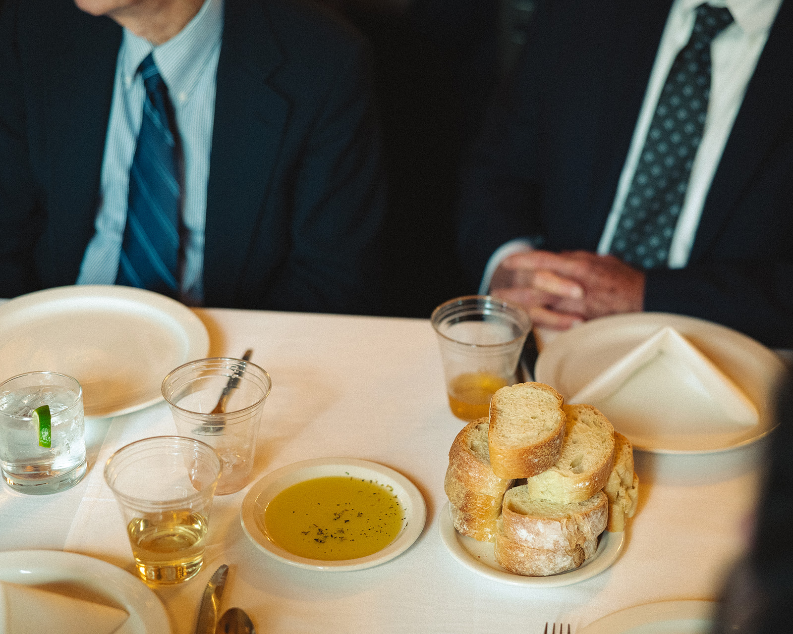 Close up shot of guests having dinner during a Michigan wedding reception near Grand Rapids. 