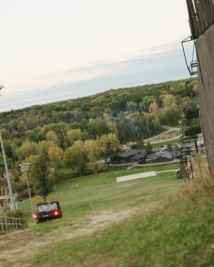 Side-by-side going back down the hill to the reception space. 