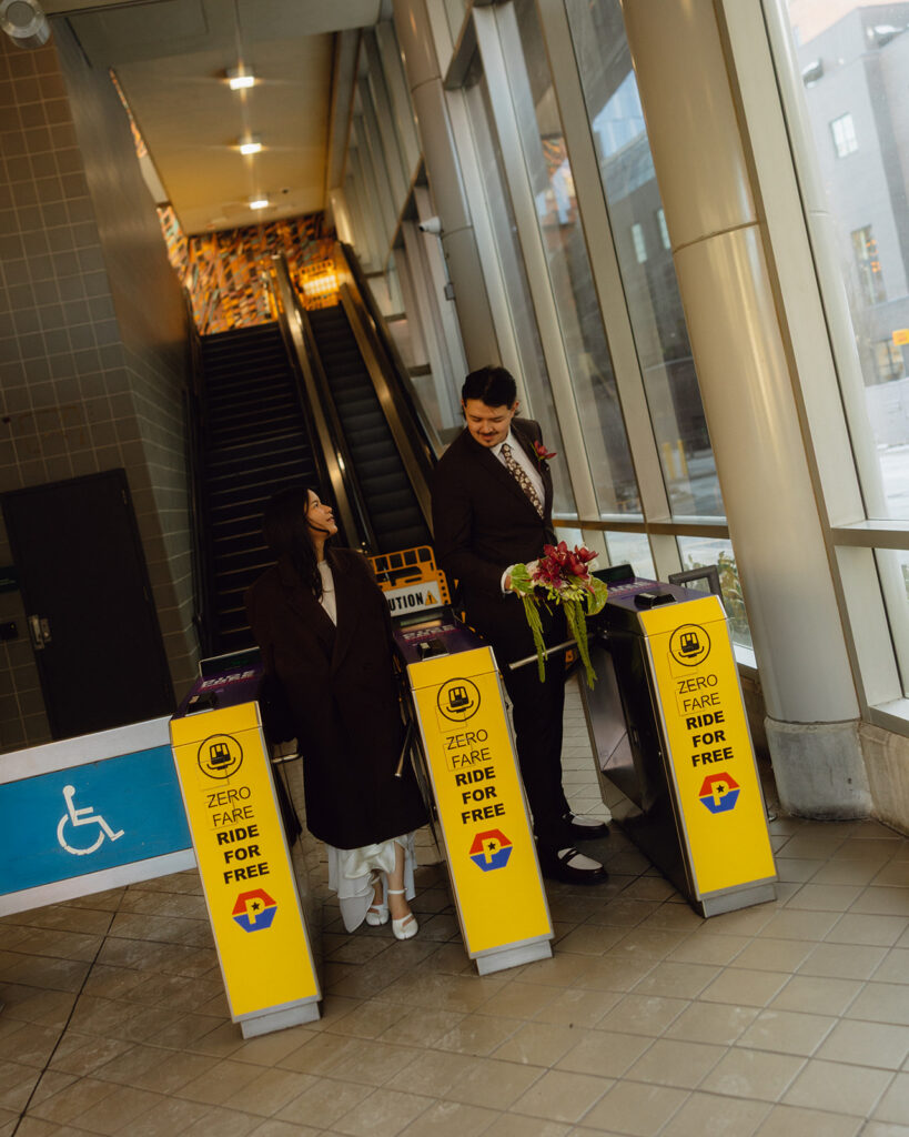 Bride and groom as they get off the People Mover in Detroit.
