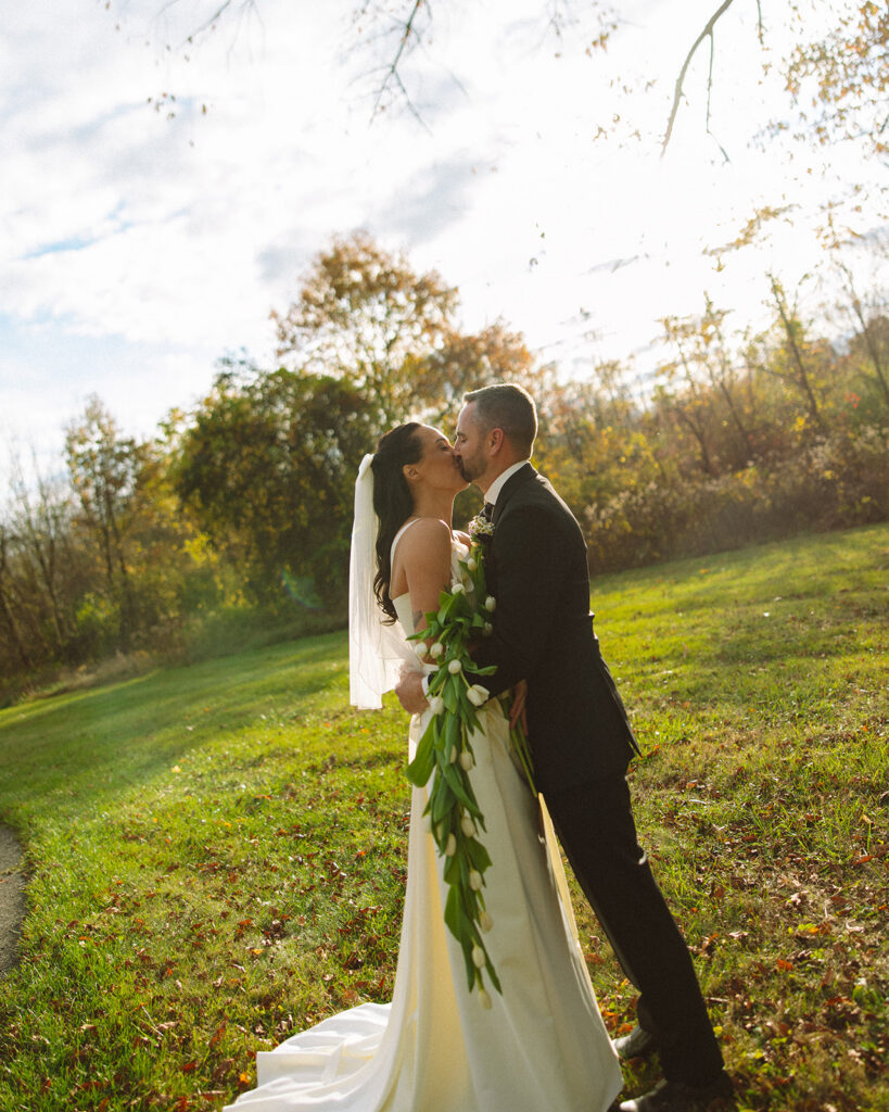 Bride and groom laughing after their first look.
