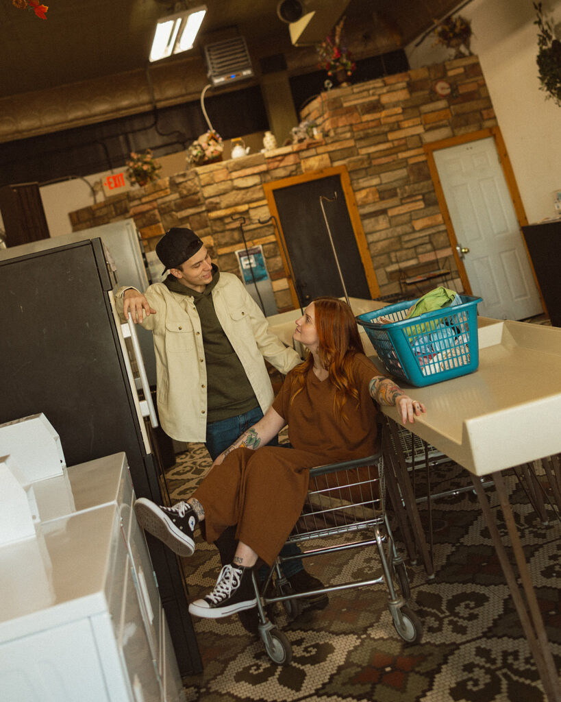 Cute laundromat photoshoot with a couple for their engagement.